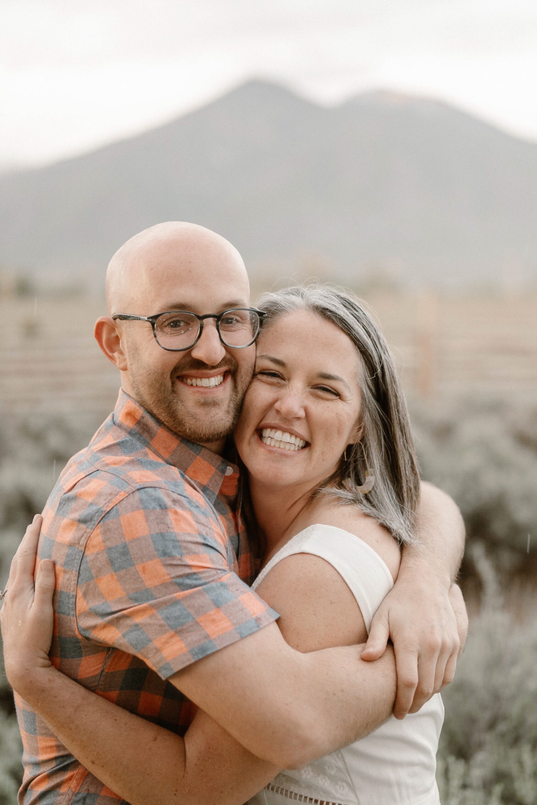 Engagement photos taken in downtown Taos, New Mexico. Photos by Telluride wedding photographer Ashley Joyce Photography.