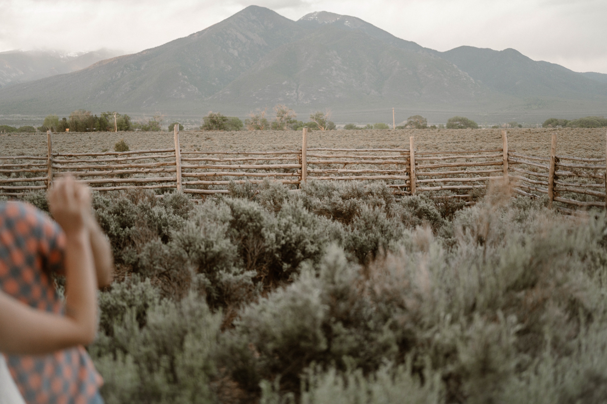 Engagement photos taken in downtown Taos, New Mexico. Photos by Telluride wedding photographer Ashley Joyce Photography.