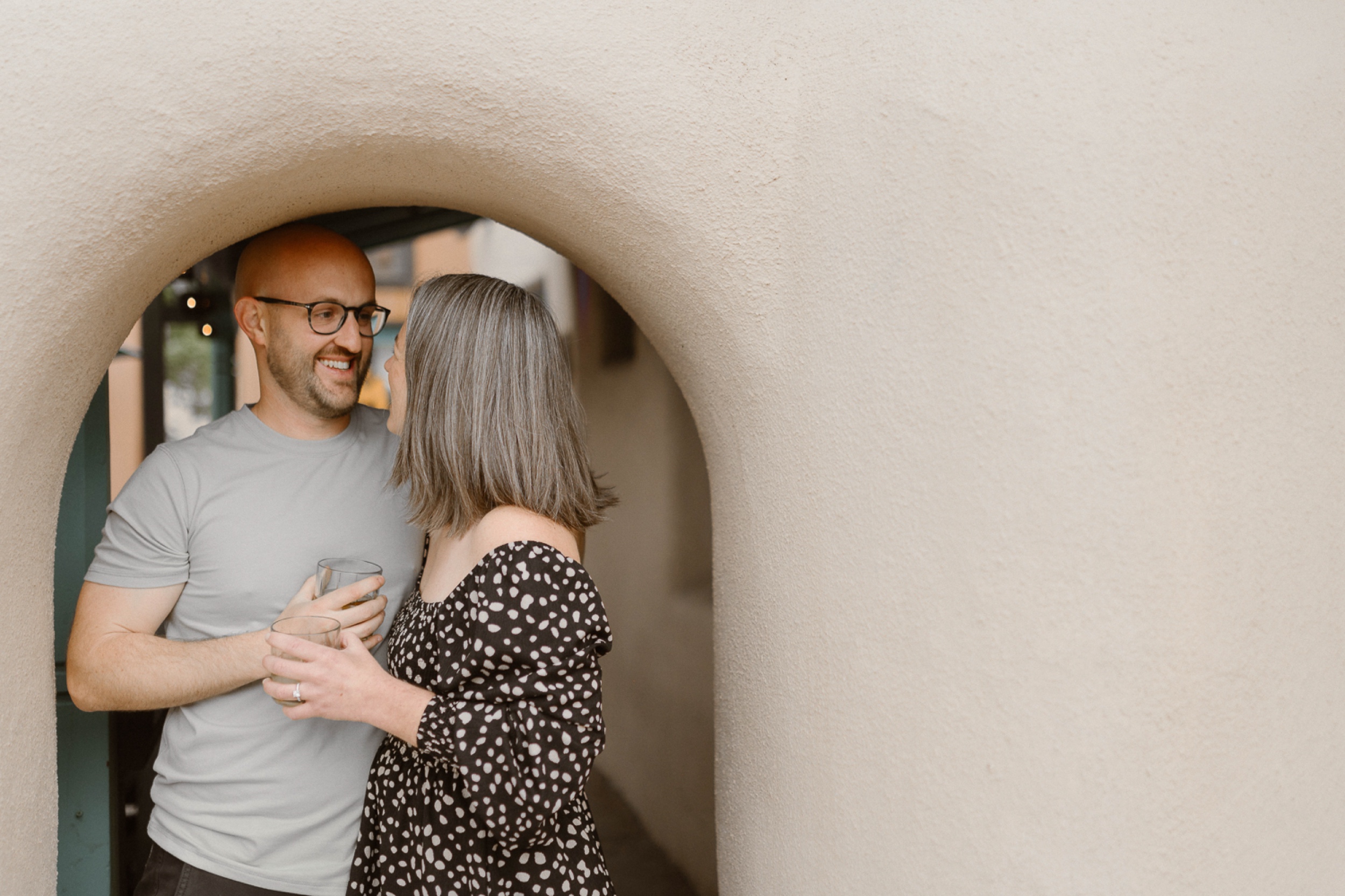 Engagement photos taken in downtown Taos, New Mexico. Photos by Telluride wedding photographer Ashley Joyce Photography.