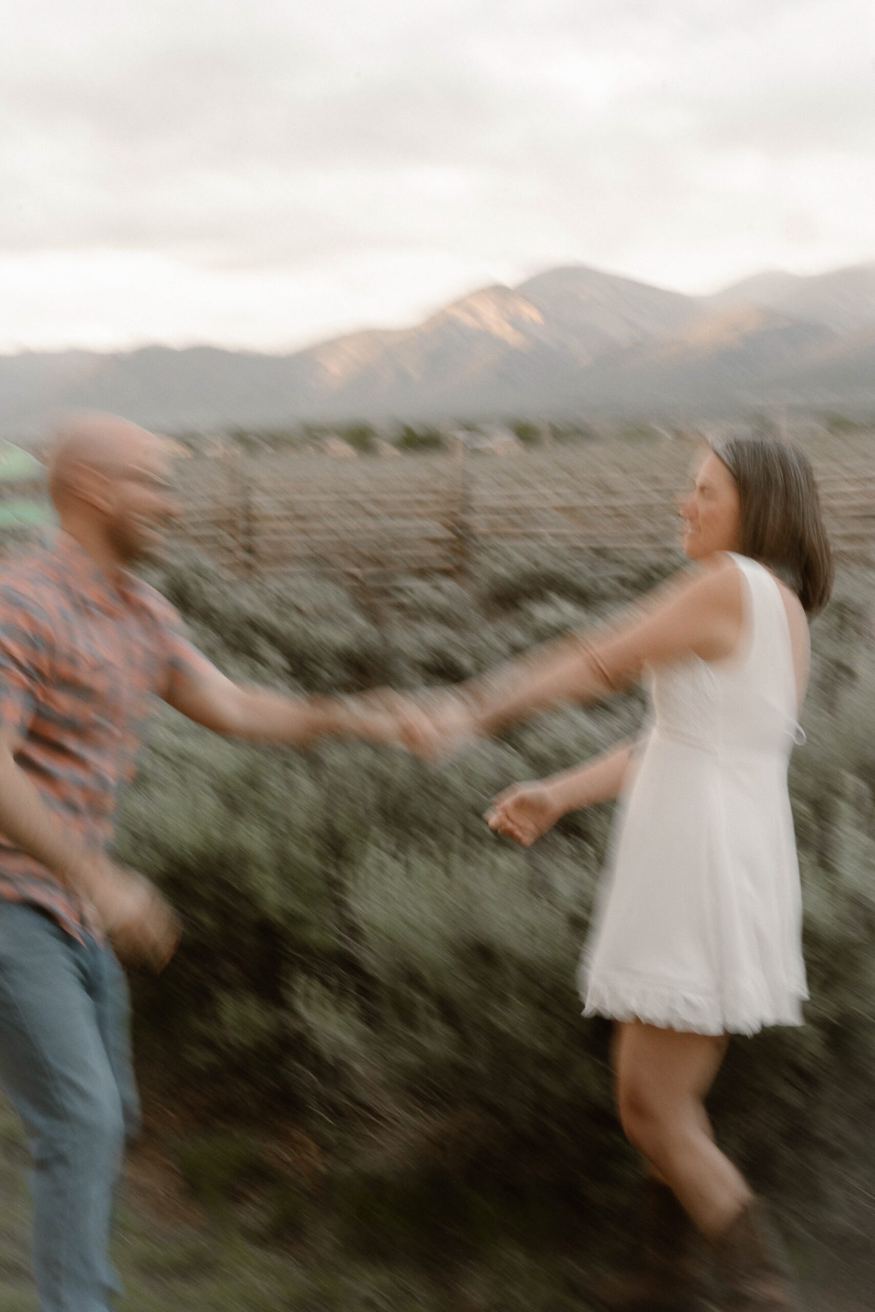 Engagement photos taken in downtown Taos, New Mexico. Photos by Telluride wedding photographer Ashley Joyce Photography.