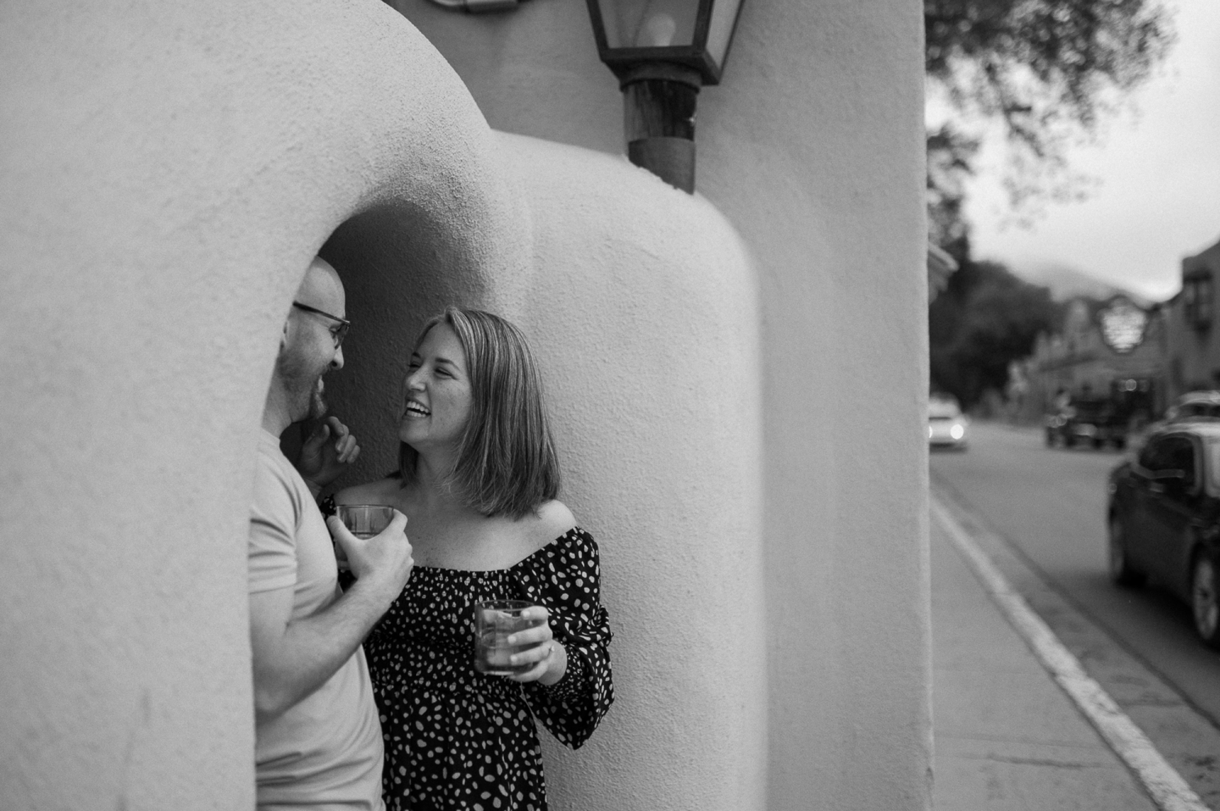 Engagement photos taken in downtown Taos, New Mexico. Photos by Telluride wedding photographer Ashley Joyce Photography.