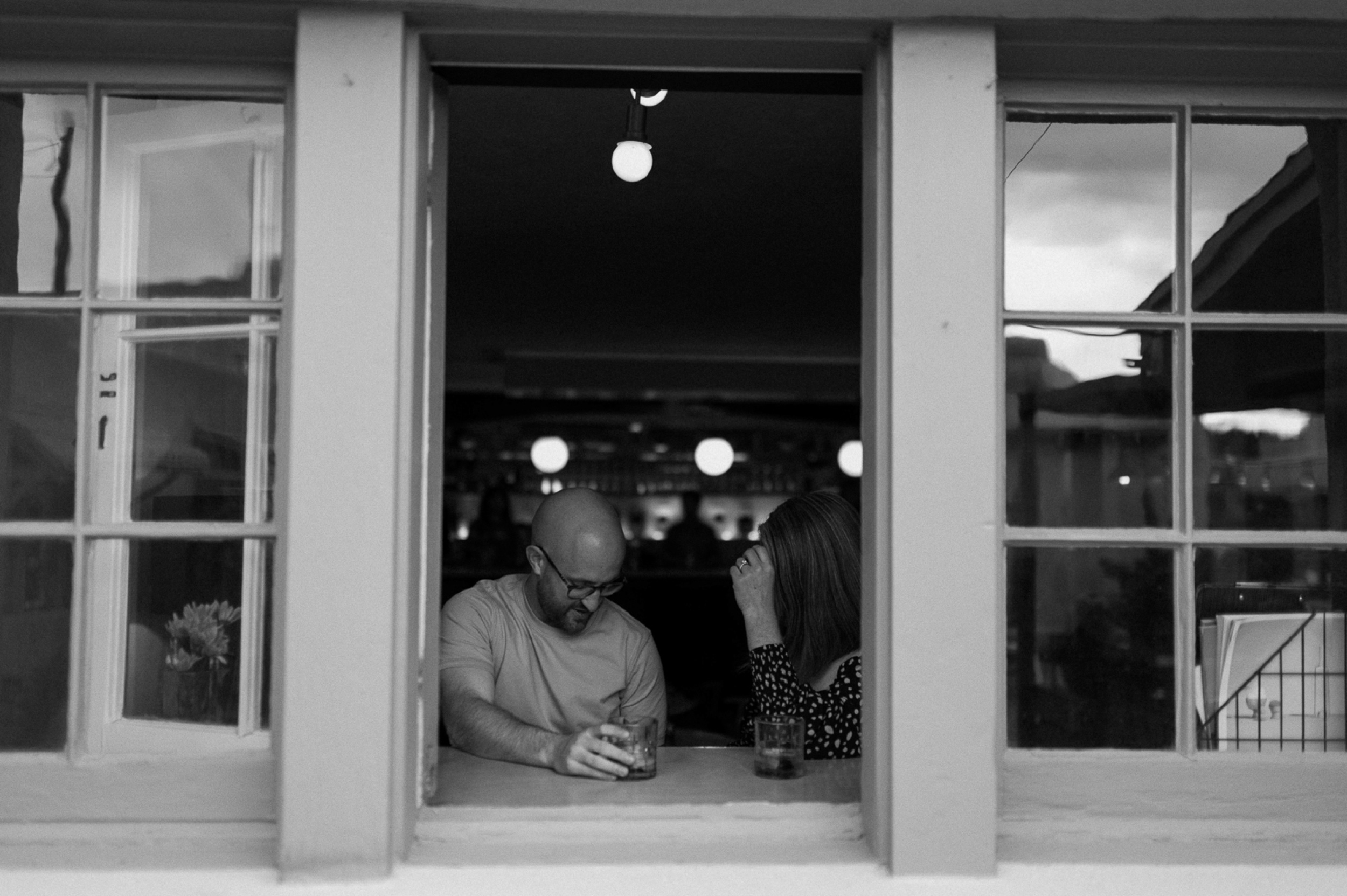 Engagement photos taken in downtown Taos, New Mexico. Photos by Telluride wedding photographer Ashley Joyce Photography.