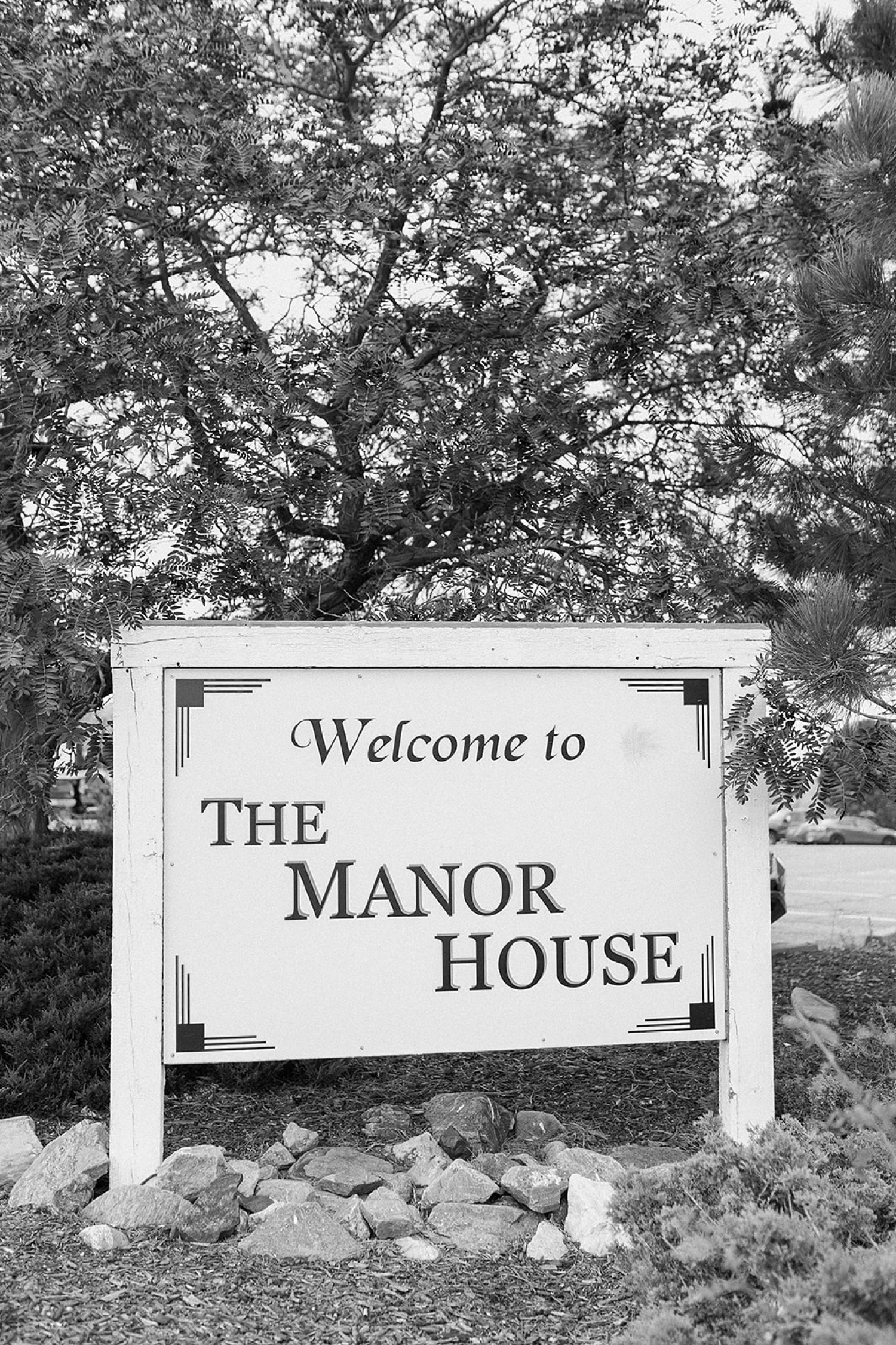 Welcome sign of The Manor House wedding venue