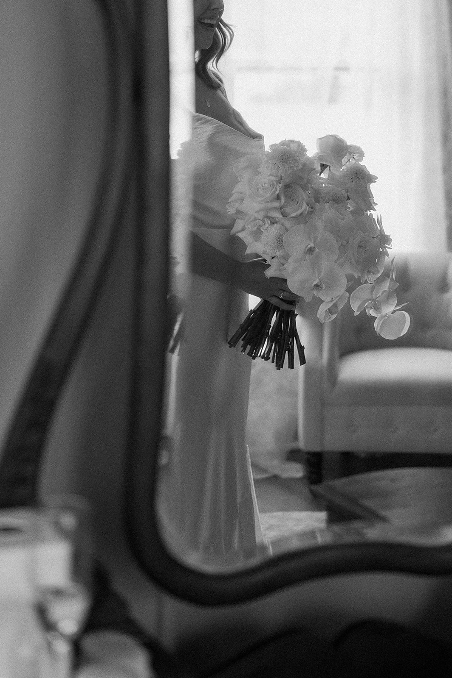 A bride holding her wedding bouquet