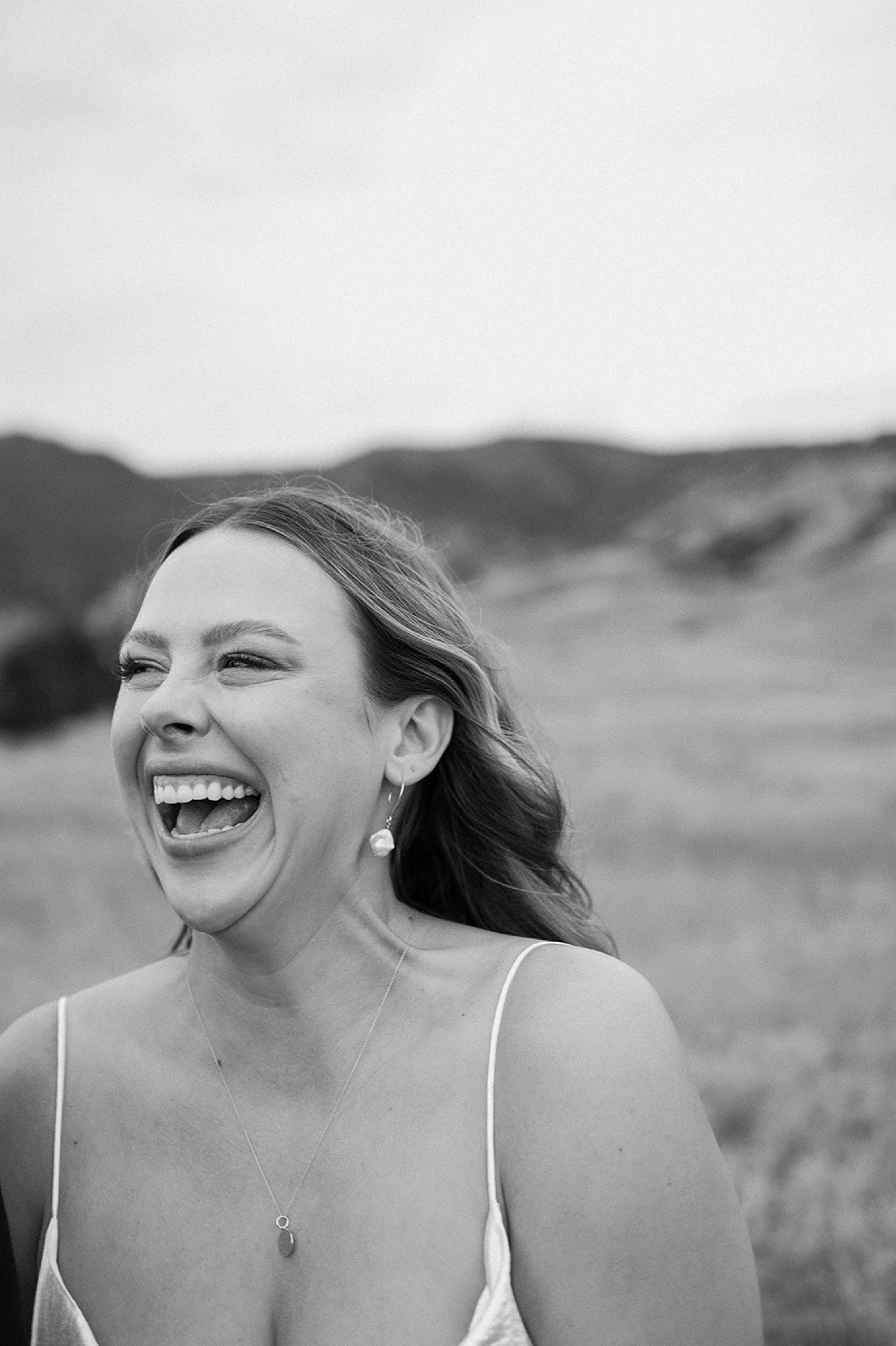 A smiling photo of a bride