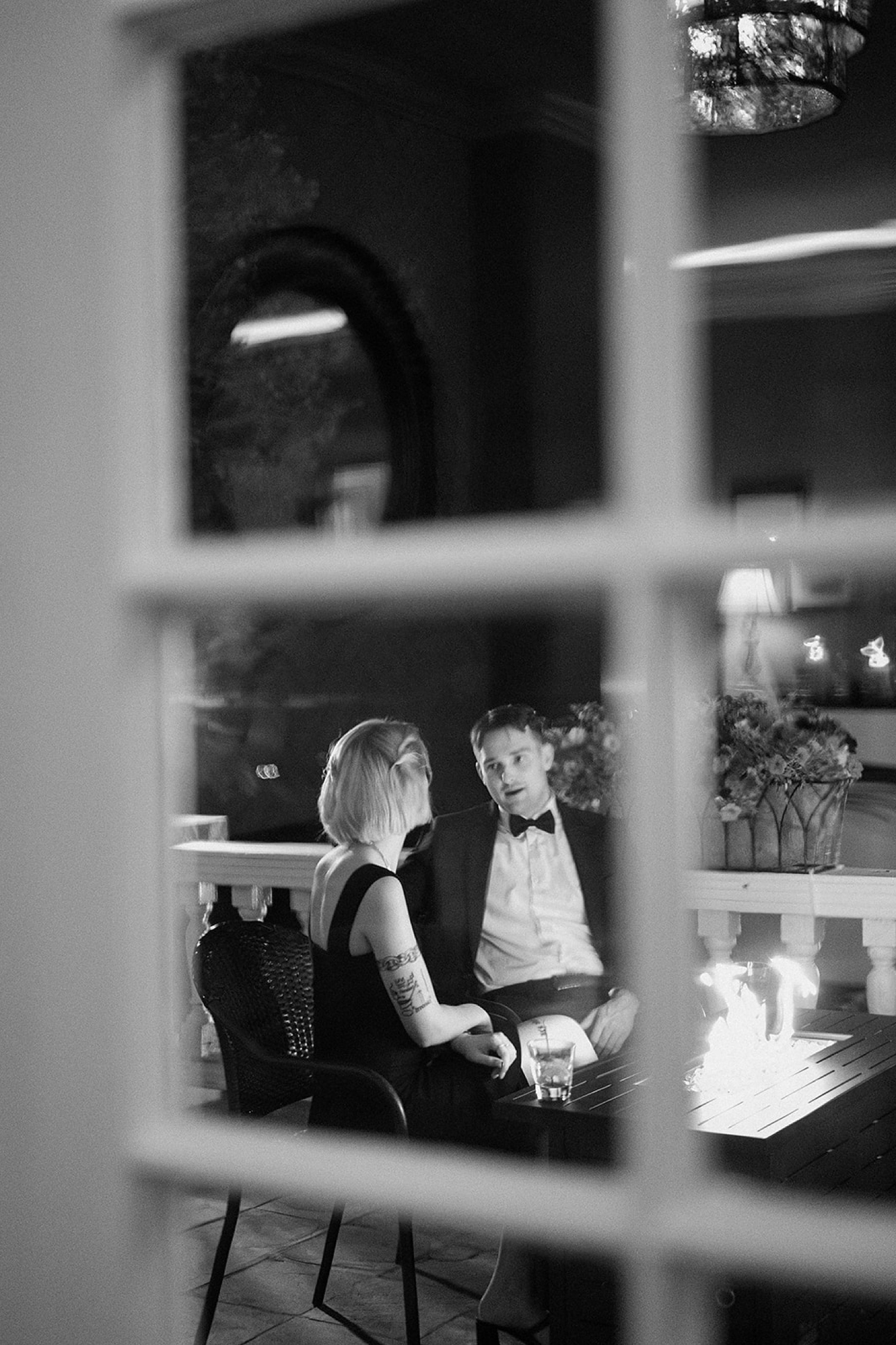 Wedding guests enjoy the patio at The Manor House