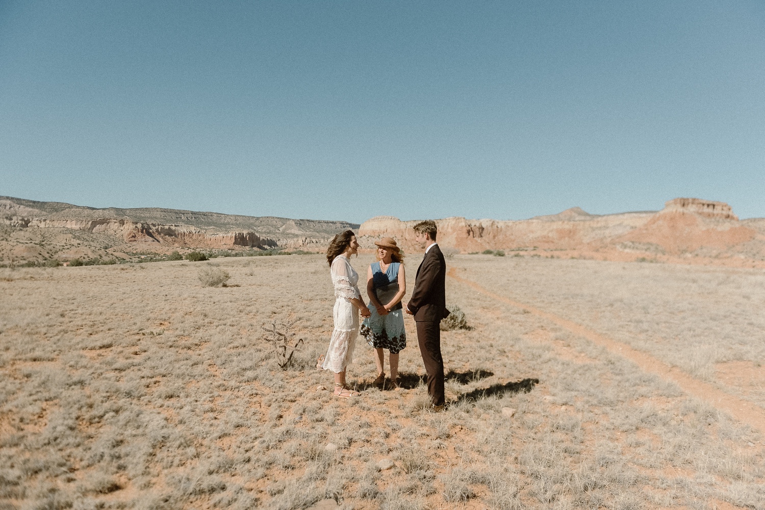 An intimate Ghost Ranch wedding on a beautiful summer day in Abiquiu, New Mexico. Photographed by Durango and Telluride wedding photographer Ashley Joyce.