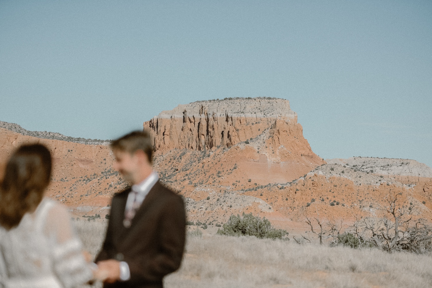 An intimate Ghost Ranch wedding on a beautiful summer day in Abiquiu, New Mexico. Photographed by Durango and Telluride wedding photographer Ashley Joyce.