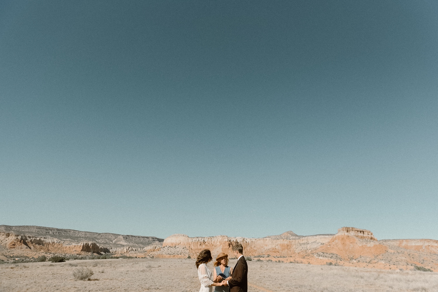 An intimate Ghost Ranch wedding on a beautiful summer day in Abiquiu, New Mexico. Photographed by Durango and Telluride wedding photographer Ashley Joyce.