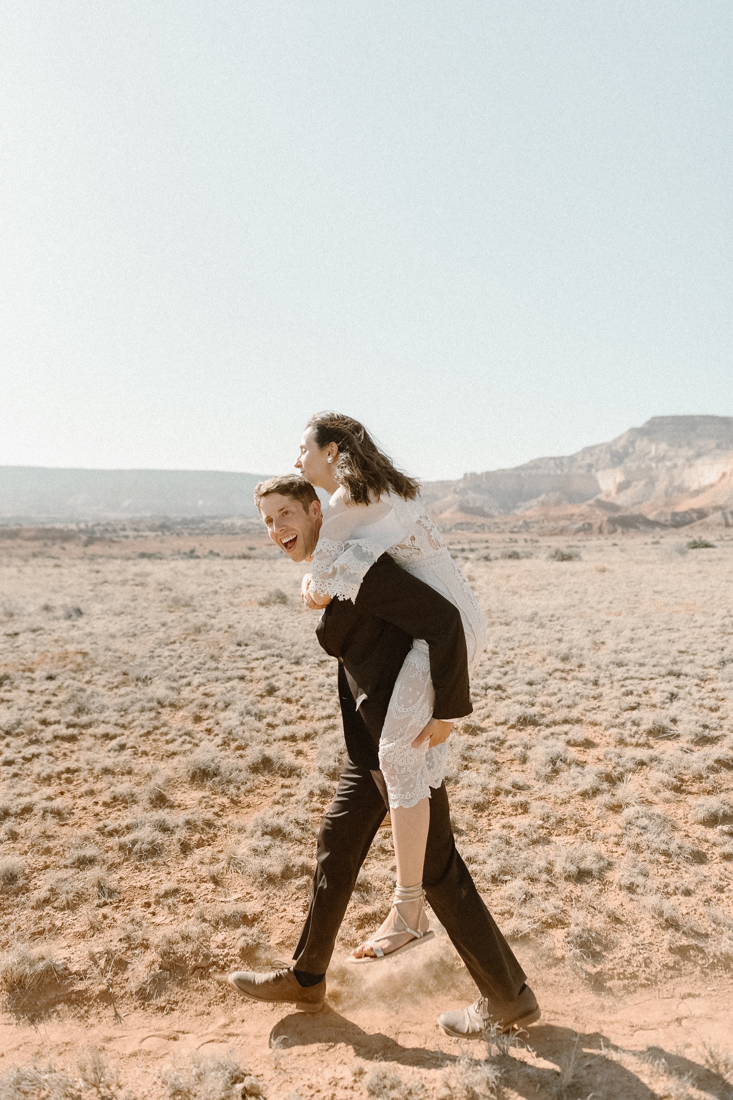 An intimate Ghost Ranch wedding on a beautiful summer day in Abiquiu, New Mexico. Photographed by Durango and Telluride wedding photographer Ashley Joyce.