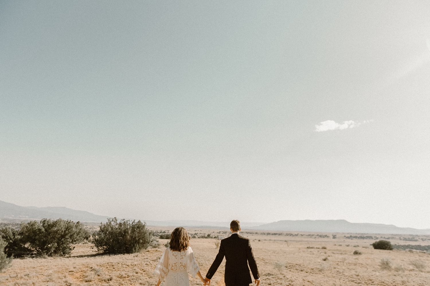 An intimate Ghost Ranch wedding on a beautiful summer day in Abiquiu, New Mexico. Photographed by Durango and Telluride wedding photographer Ashley Joyce.