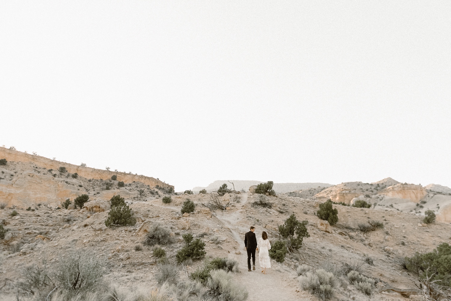 An intimate Ghost Ranch wedding on a beautiful summer day in Abiquiu, New Mexico. Photographed by Durango and Telluride wedding photographer Ashley Joyce.