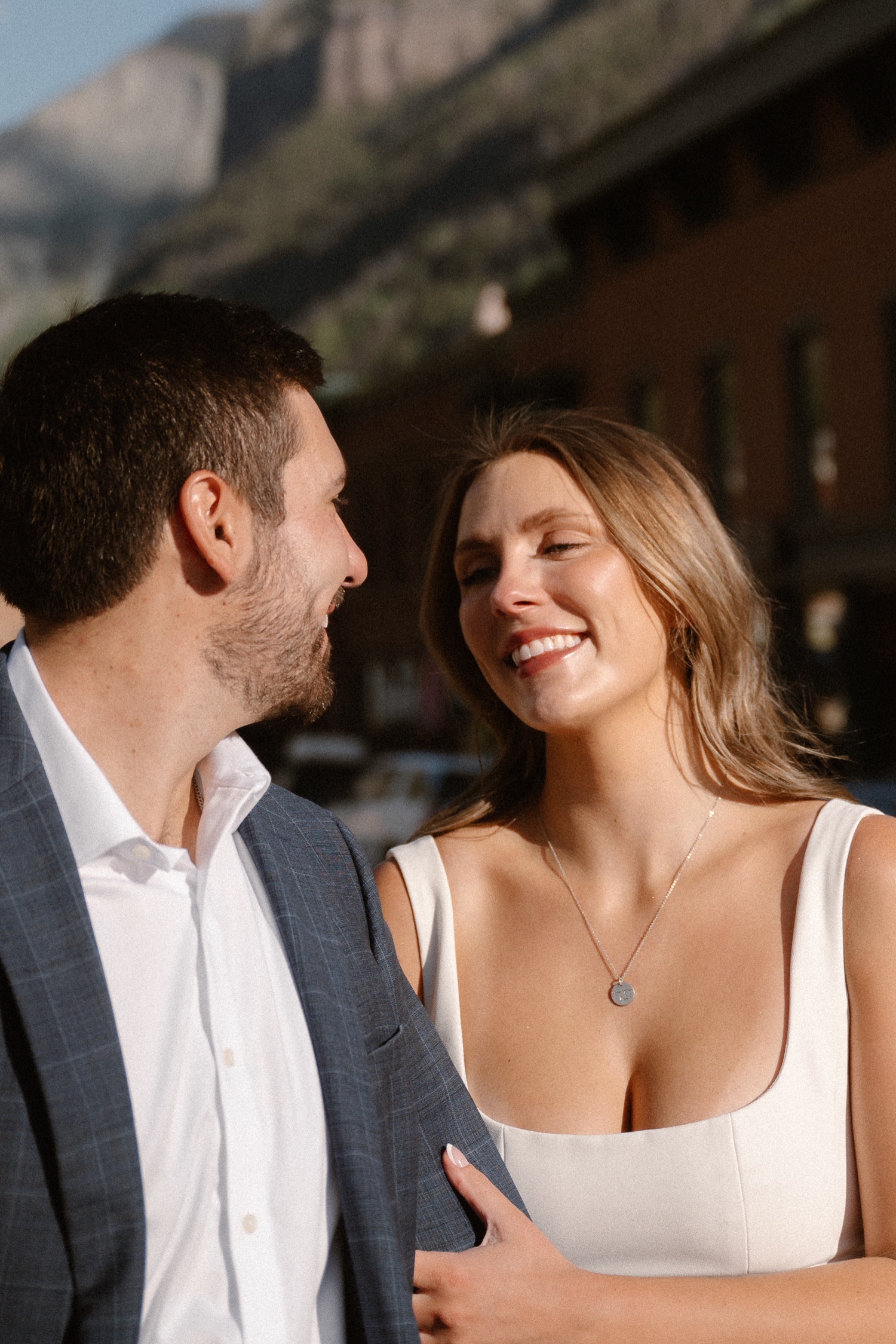 A couple poses for their Telluride engagement session in downtown Telluride, Colorado. Photo by Durango wedding photographer Ashley Joyce