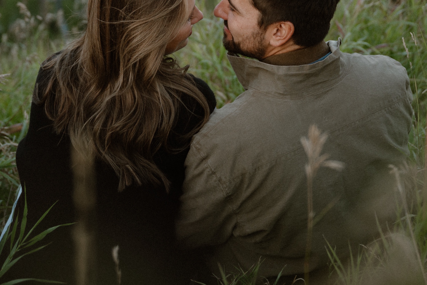 A couple poses for their Telluride engagement session at San Sophia Overlook at the Telluride ski resort. Photo by Durango wedding photographer Ashley Joyce