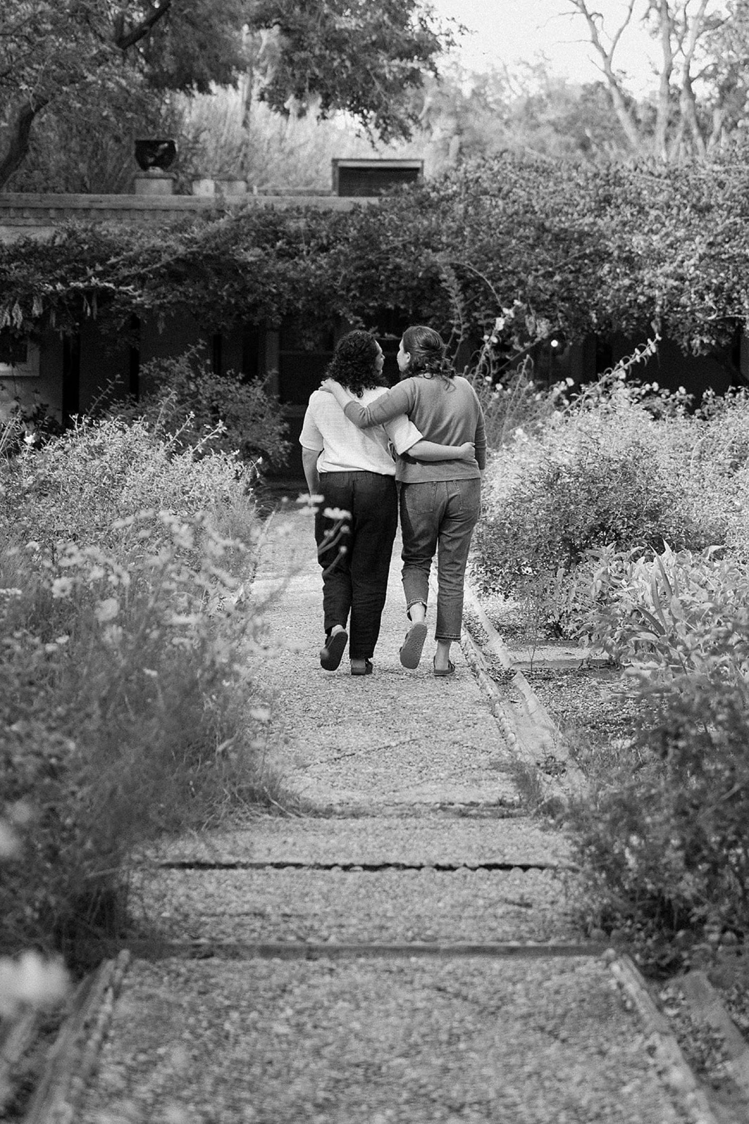 Fall foliage surrounding a couple during their engagement session at Los Poblanos Historic Inn and Lavender Farm.